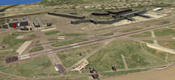 Aerial view of an airport showing runways, taxiways, and terminal buildings.